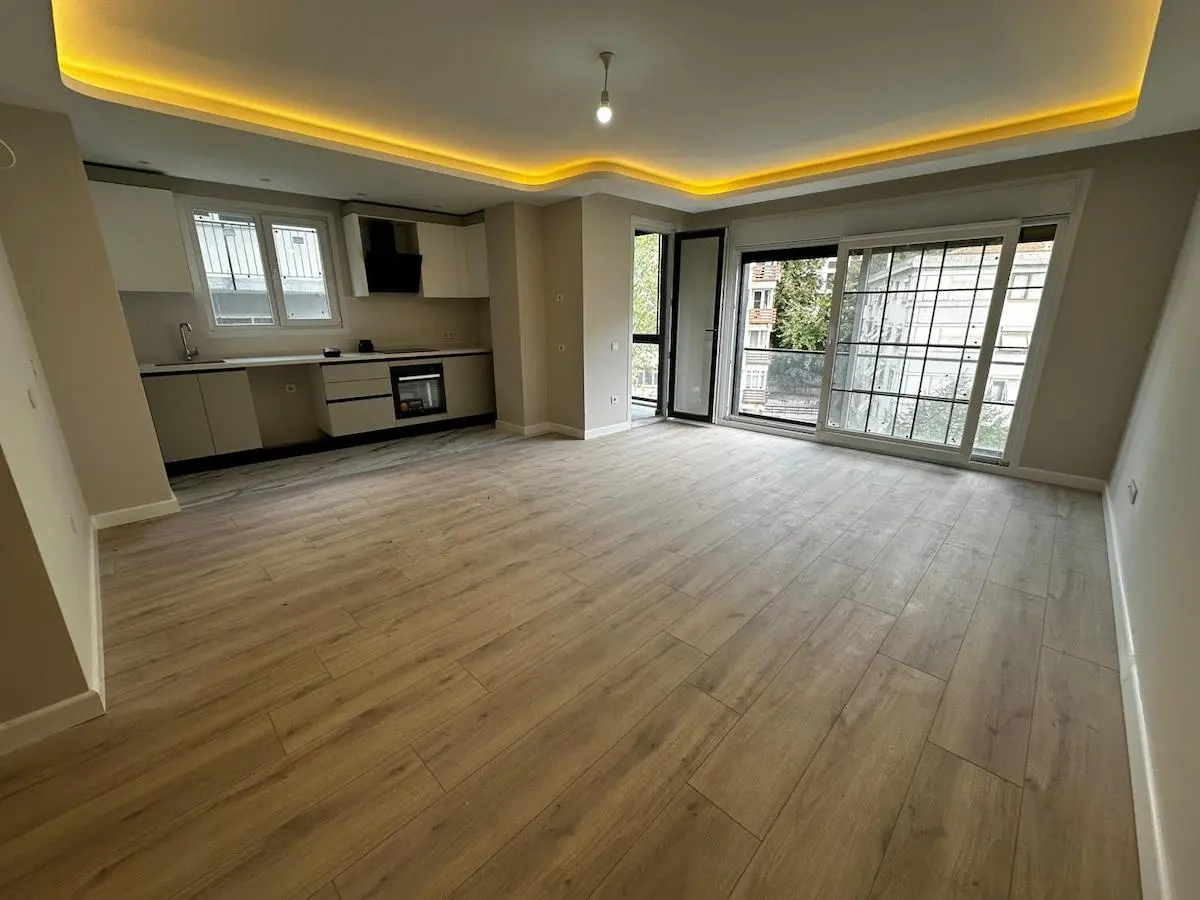Interior view of a spacious and modern living room in a Beşiktaş home, Istanbul.