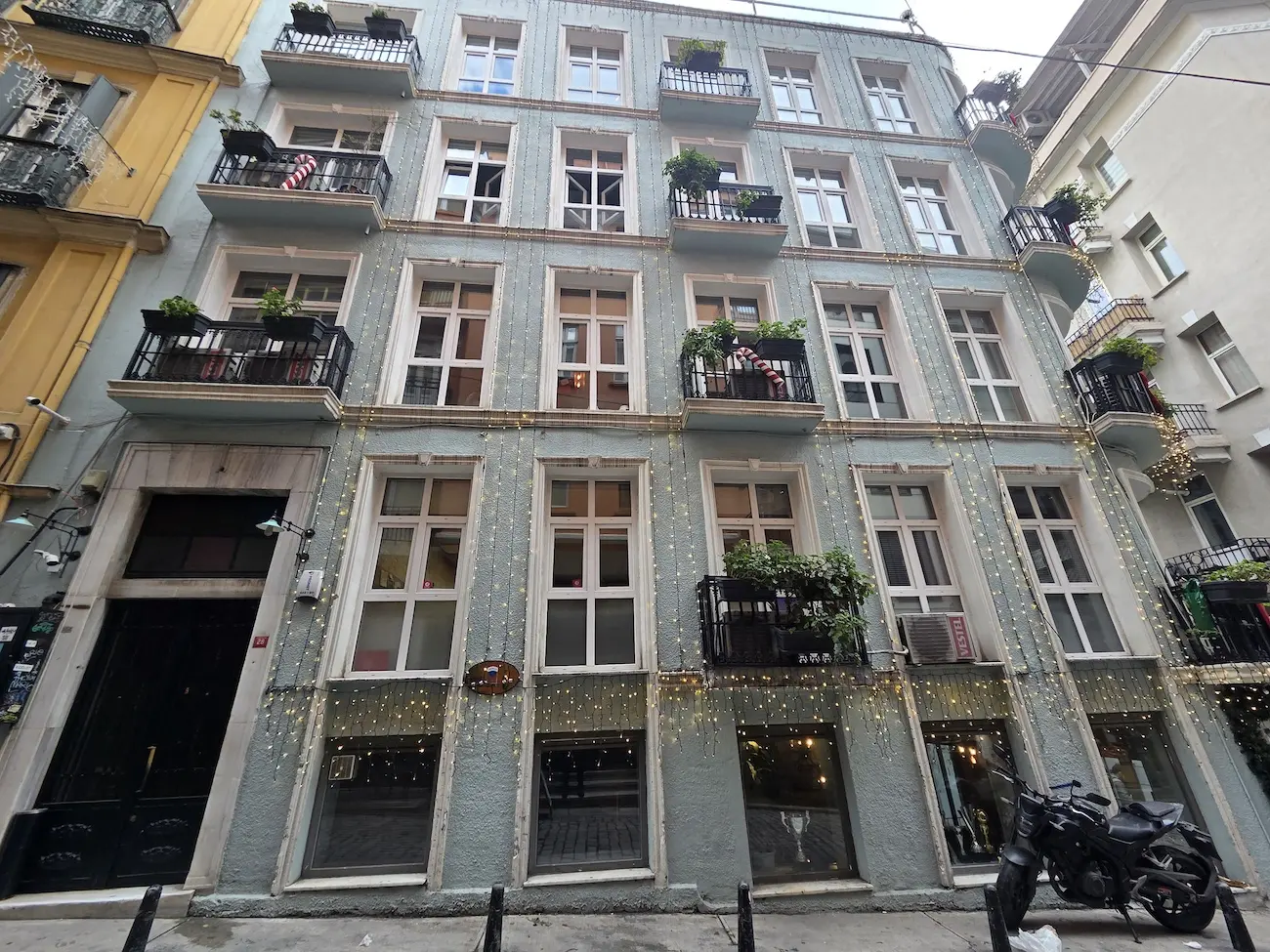 Historic building exterior with traditional architectural details and classic facade for sale in the Galata district, Istanbul.