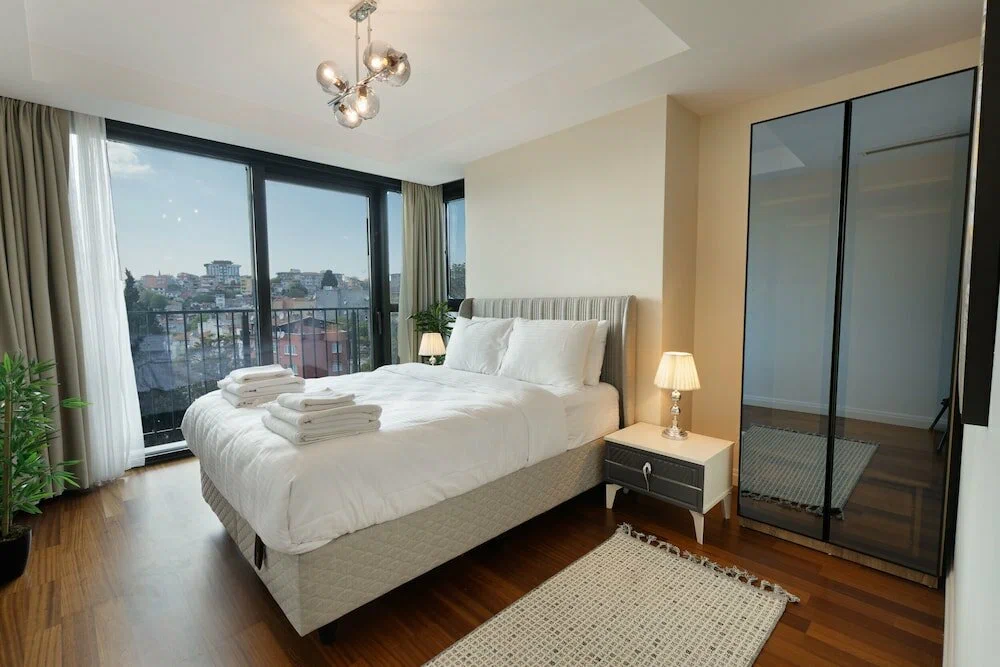 Elegant master bedroom interior with modern furnishings and contemporary design for sale in Istanbul.